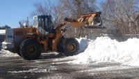 Snow Plowing Corporate Parking Lot in North Andover MA